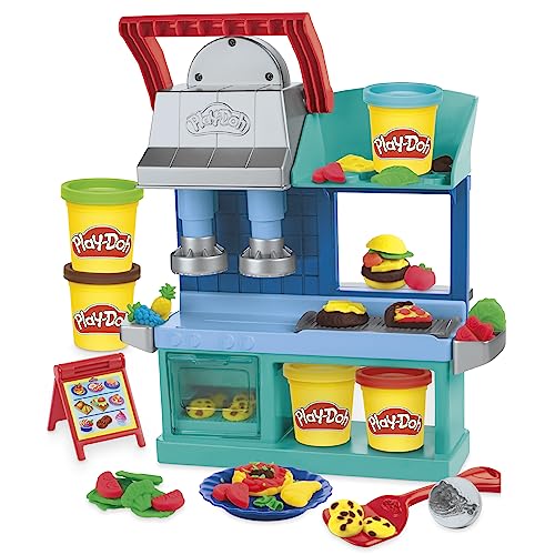 Play-Doh Kitchen Creations Busy Chef's Restaurant Playset two-sided station invites role-play dining scenarios.
