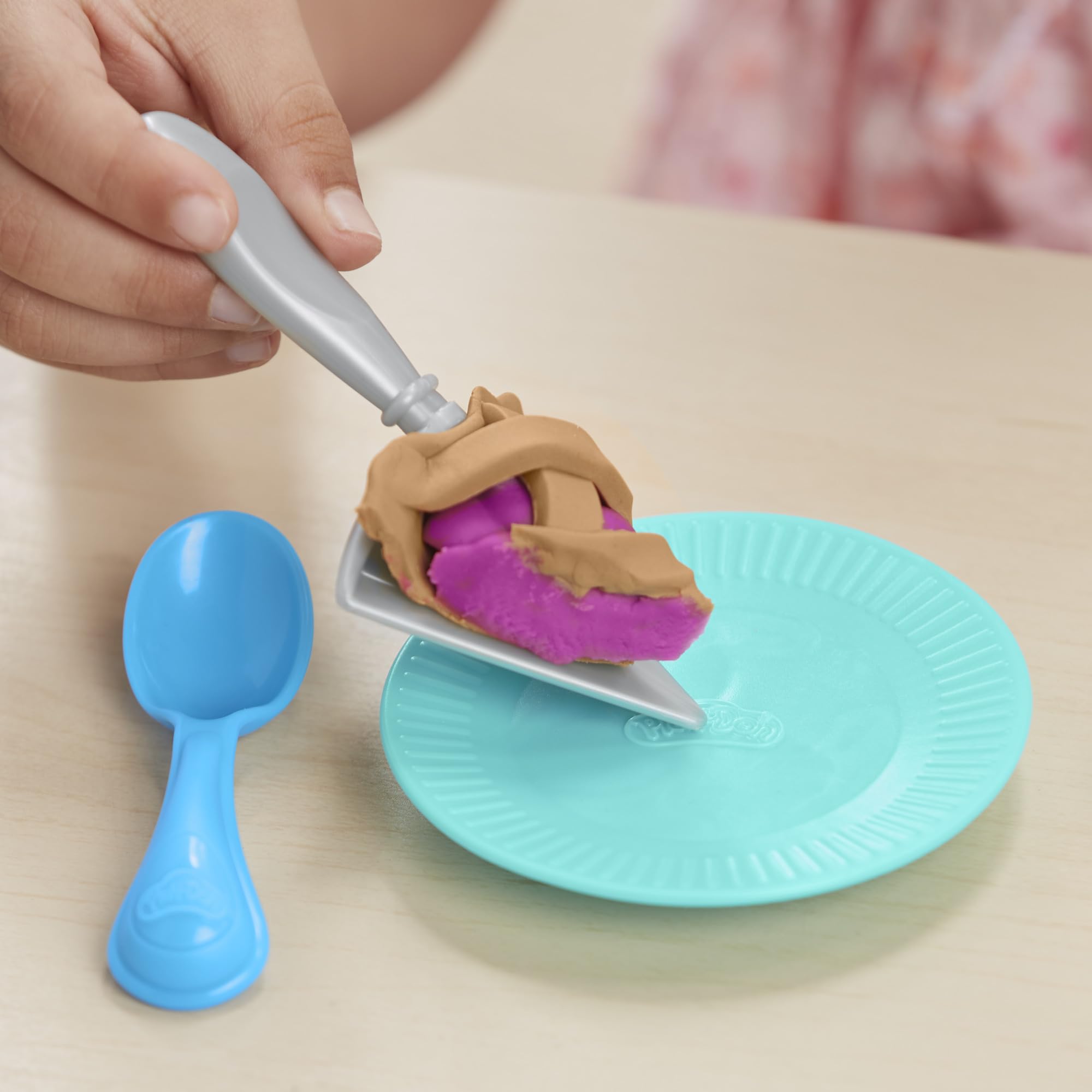 Play-Doh kitchen knife, fork, and spoon add safe dining details.