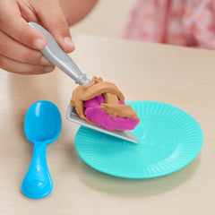Play-Doh kitchen knife, fork, and spoon add safe dining details.