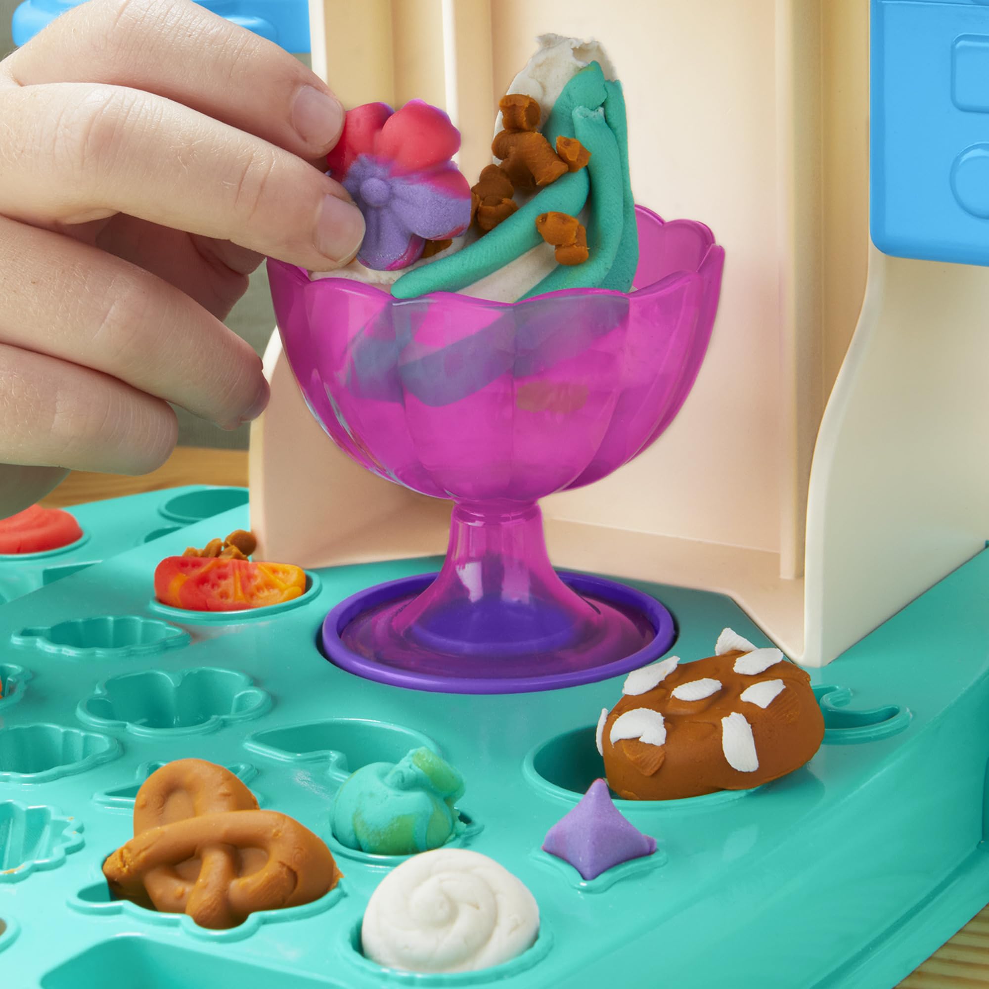 Play-Doh Rainbow Swirl ice cream cone and dish included for serving