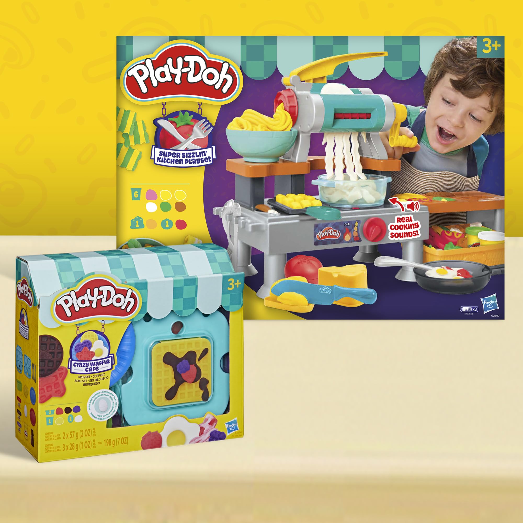 Play‑Doh waffle maker beside a child’s hand to show scale and child‑friendly size