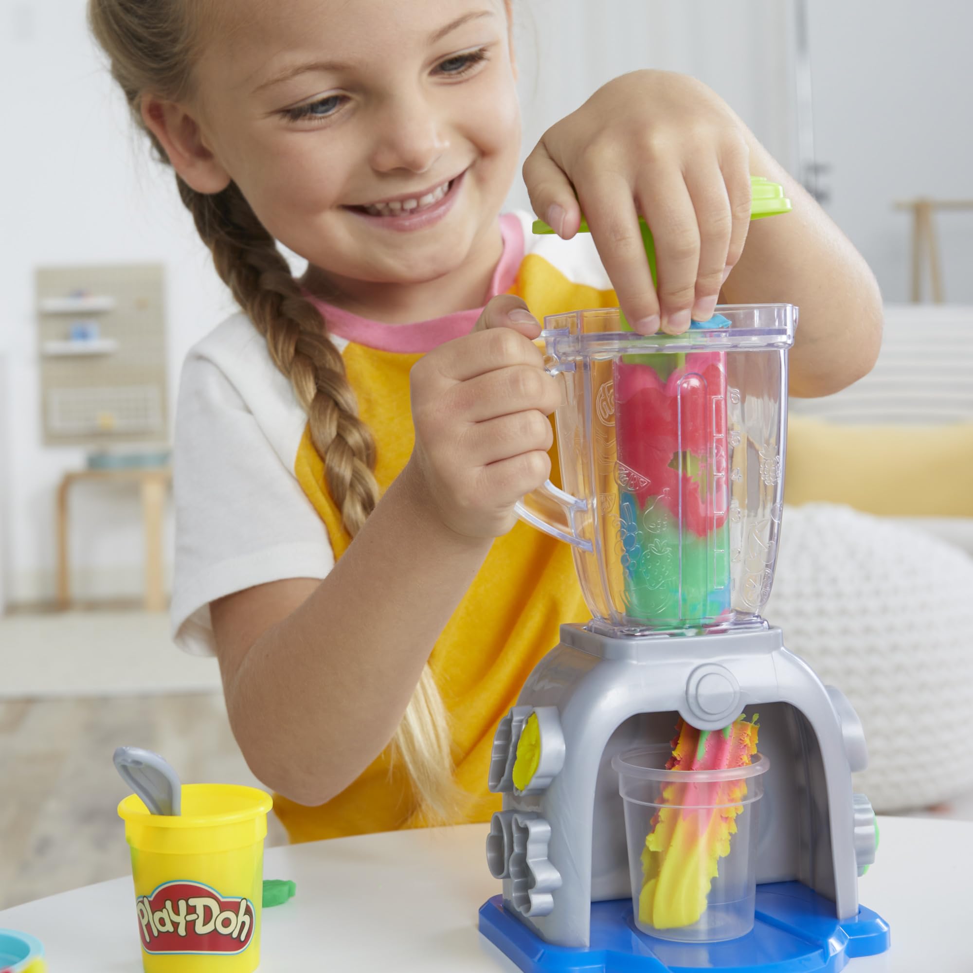 Play‑Doh blender held in hand to show scale and kid‑friendly size for easy use