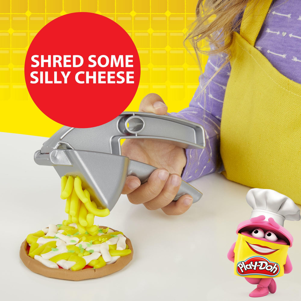 Play-Doh Stamp 'N Top cheese-crank demonstrates shredded cheese texture