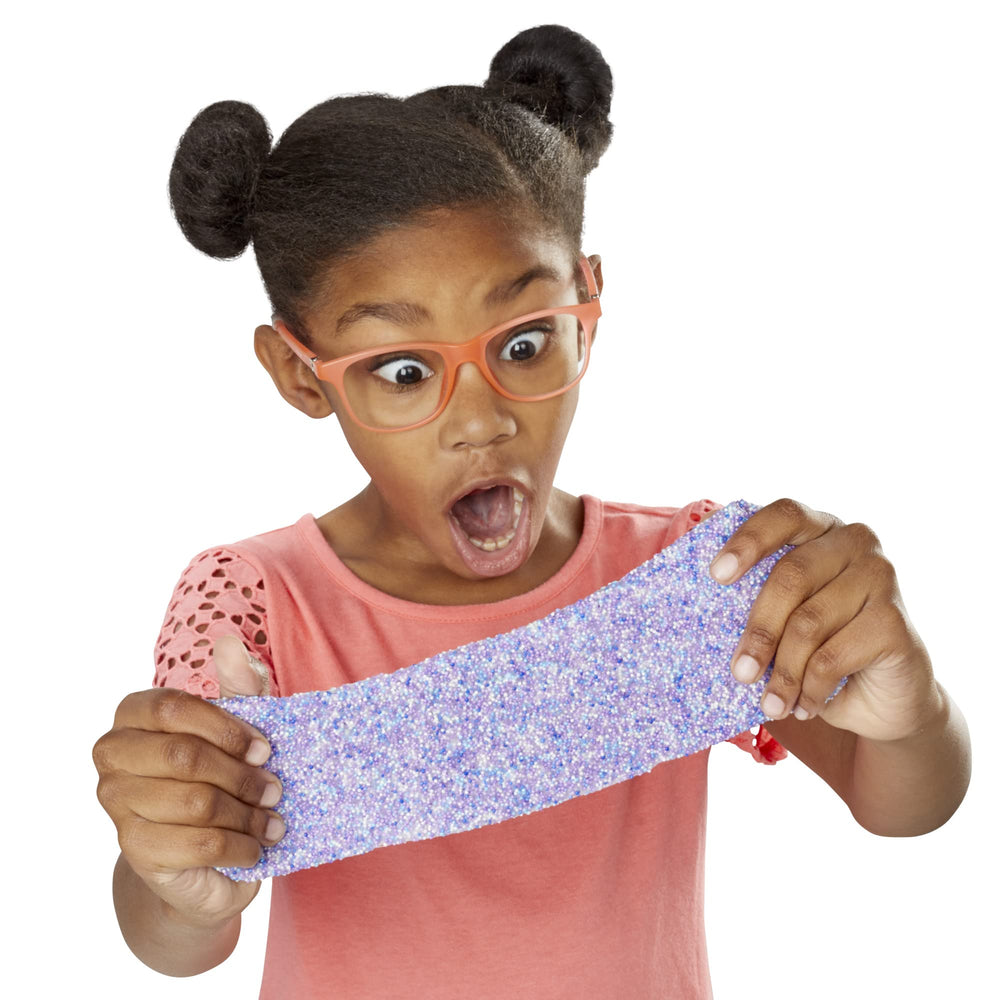 Play-Doh Super Cloud purple grape scent creates fluffy texture for storytelling.