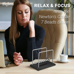 Playbees Newton's Cradle makes a thoughtful Christmas gift for science lovers.