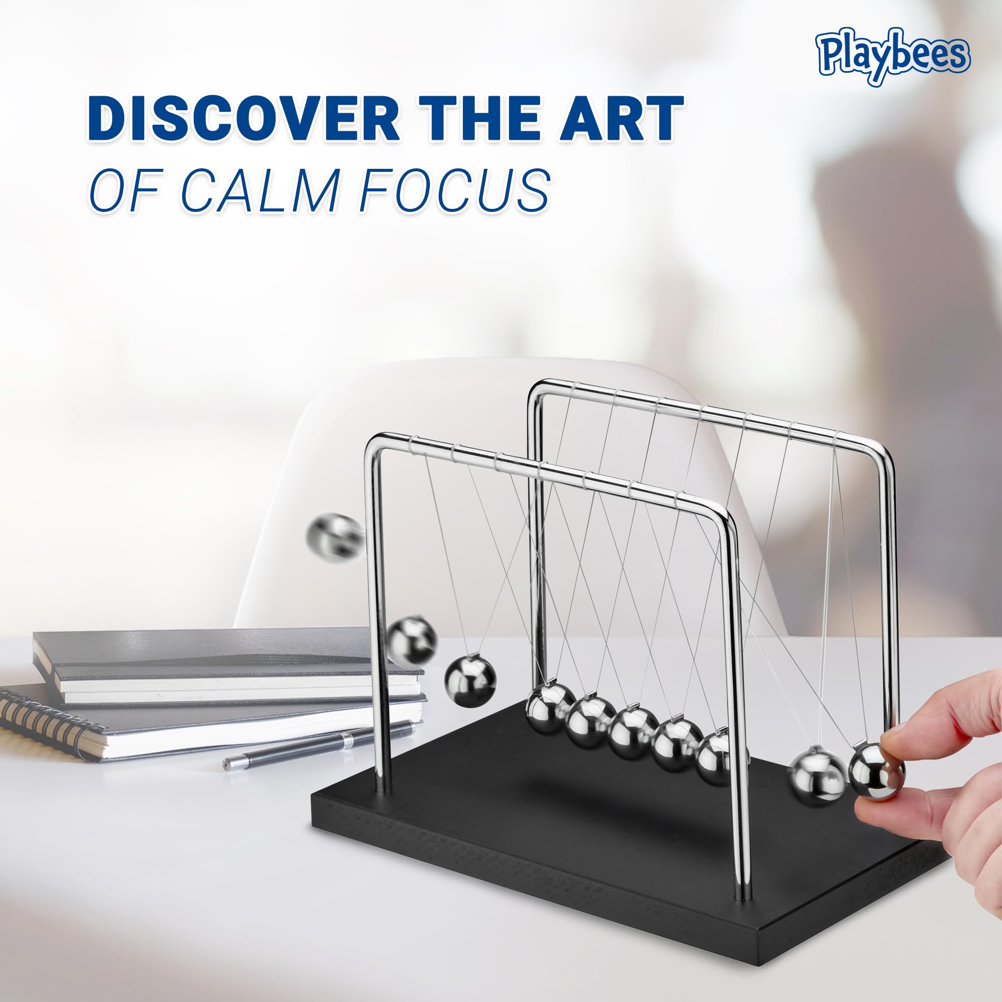 Playbees Newton's Cradle wooden base adds warm, tactile finish suitable for any desk.