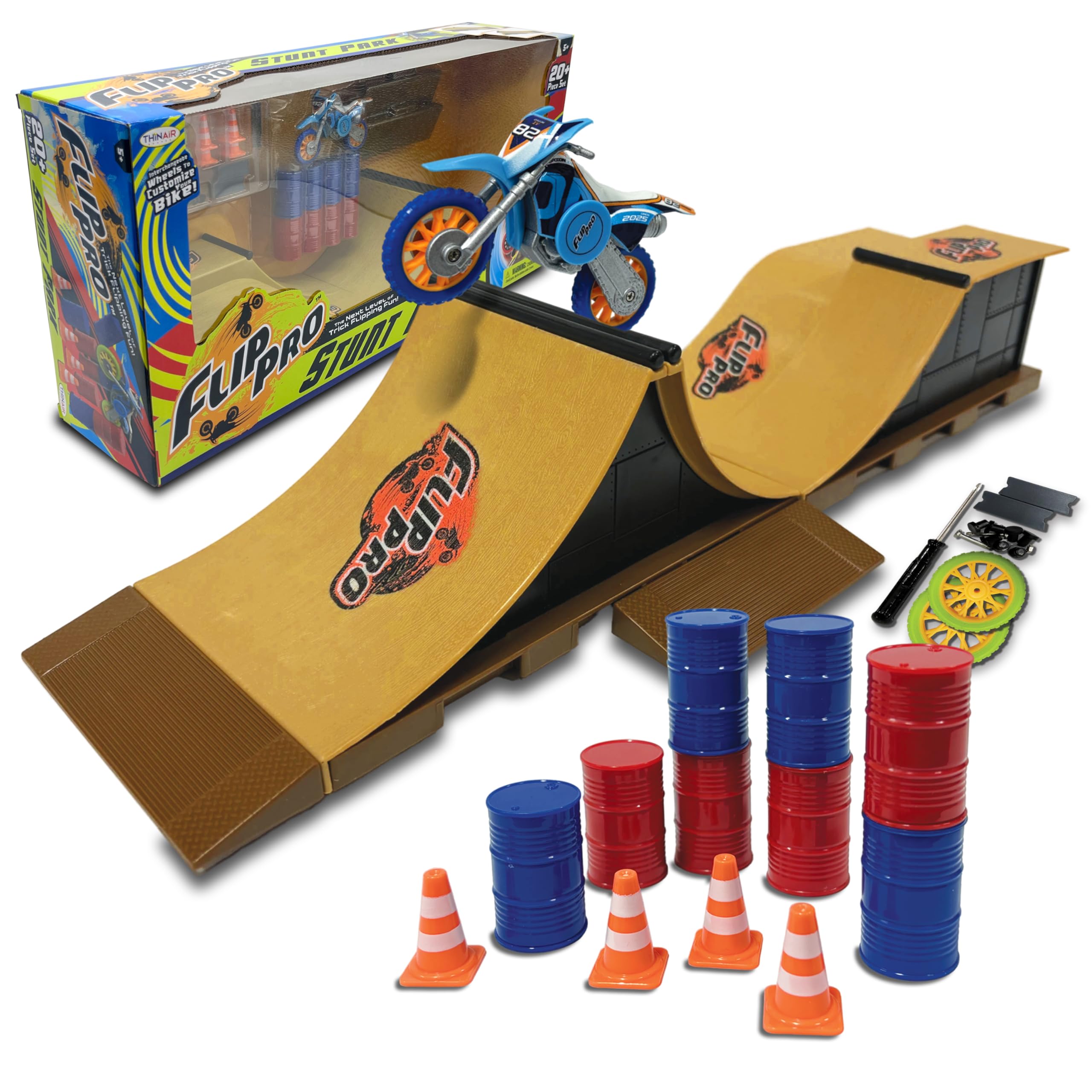 Playful Minds Flip Pro stunt park ramps in action, inspiring creative bike tricks.