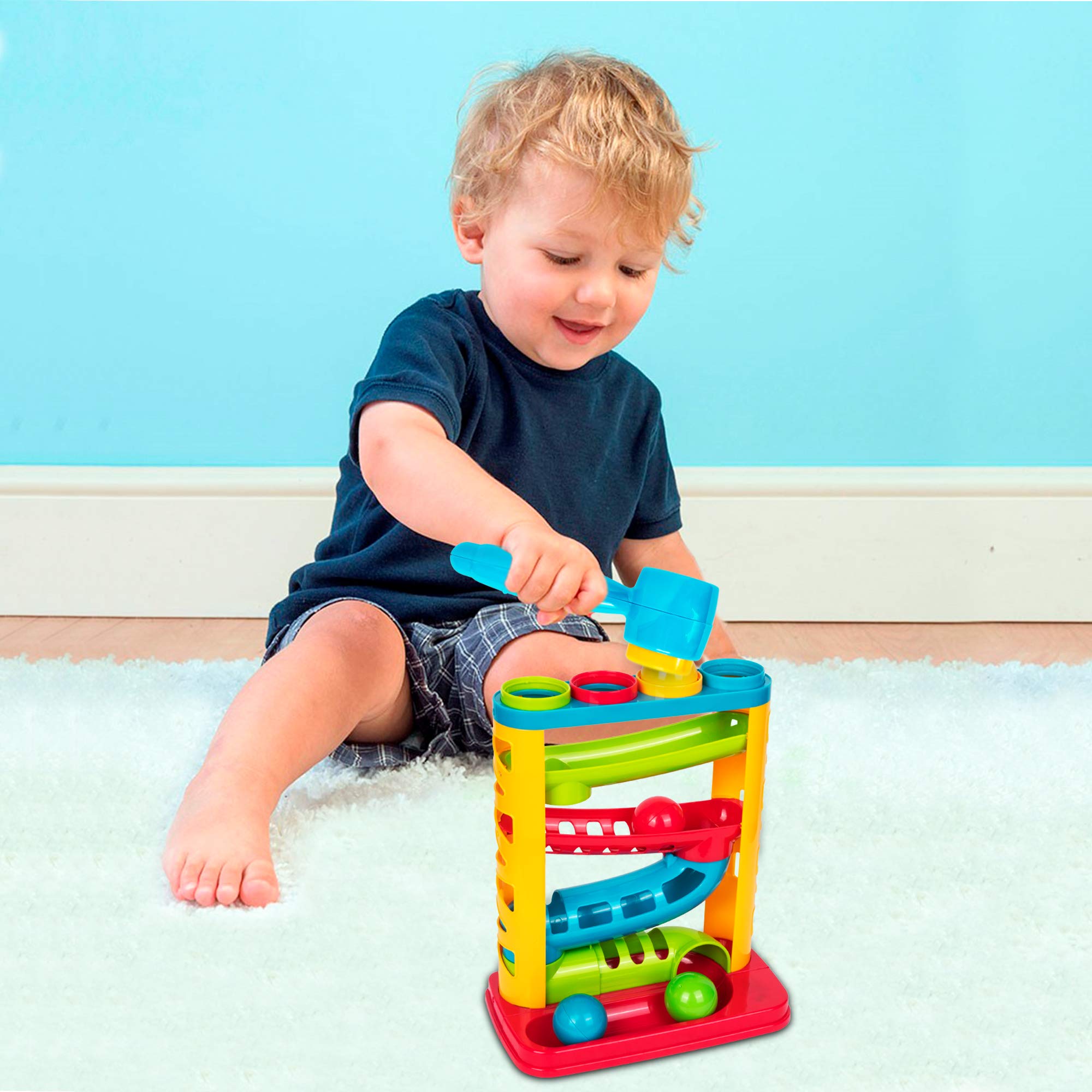Playkidz colorful balls dropping through layered chambers to boost coordination.