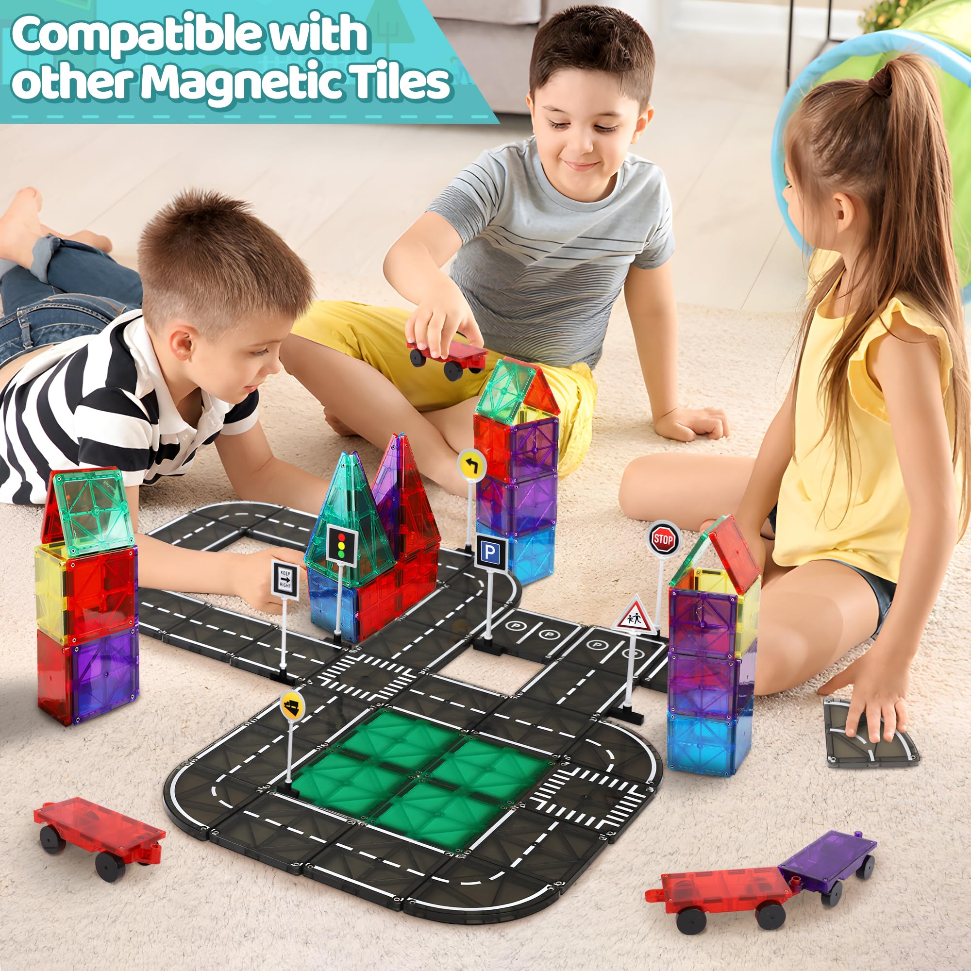 Close-up of Playmags road tiles showing magnets and glossy surface.