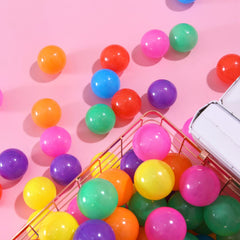 Colorful PlayMaty pit balls inspire cooperative play and counting games.
