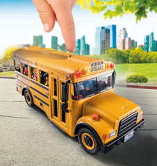 Playmobil bus driver figure leads classroom adventures.