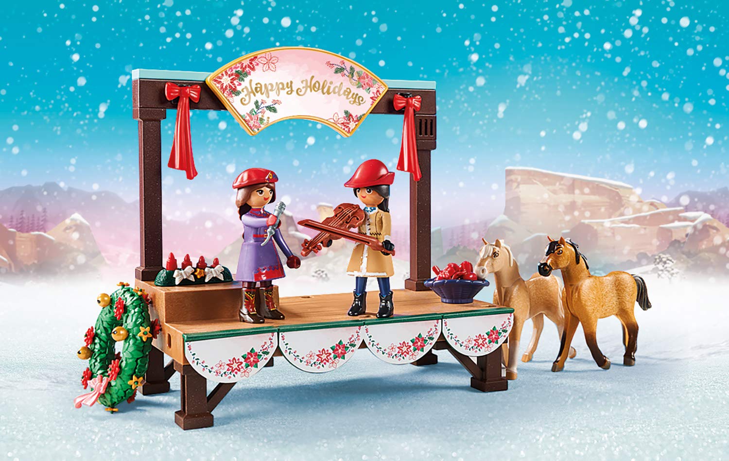 Playmobil stage with microphone and festive decorations for creative performances.