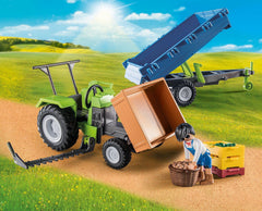 Playmobil Harvester Tractor with Trailer includes figure and farming accessories.