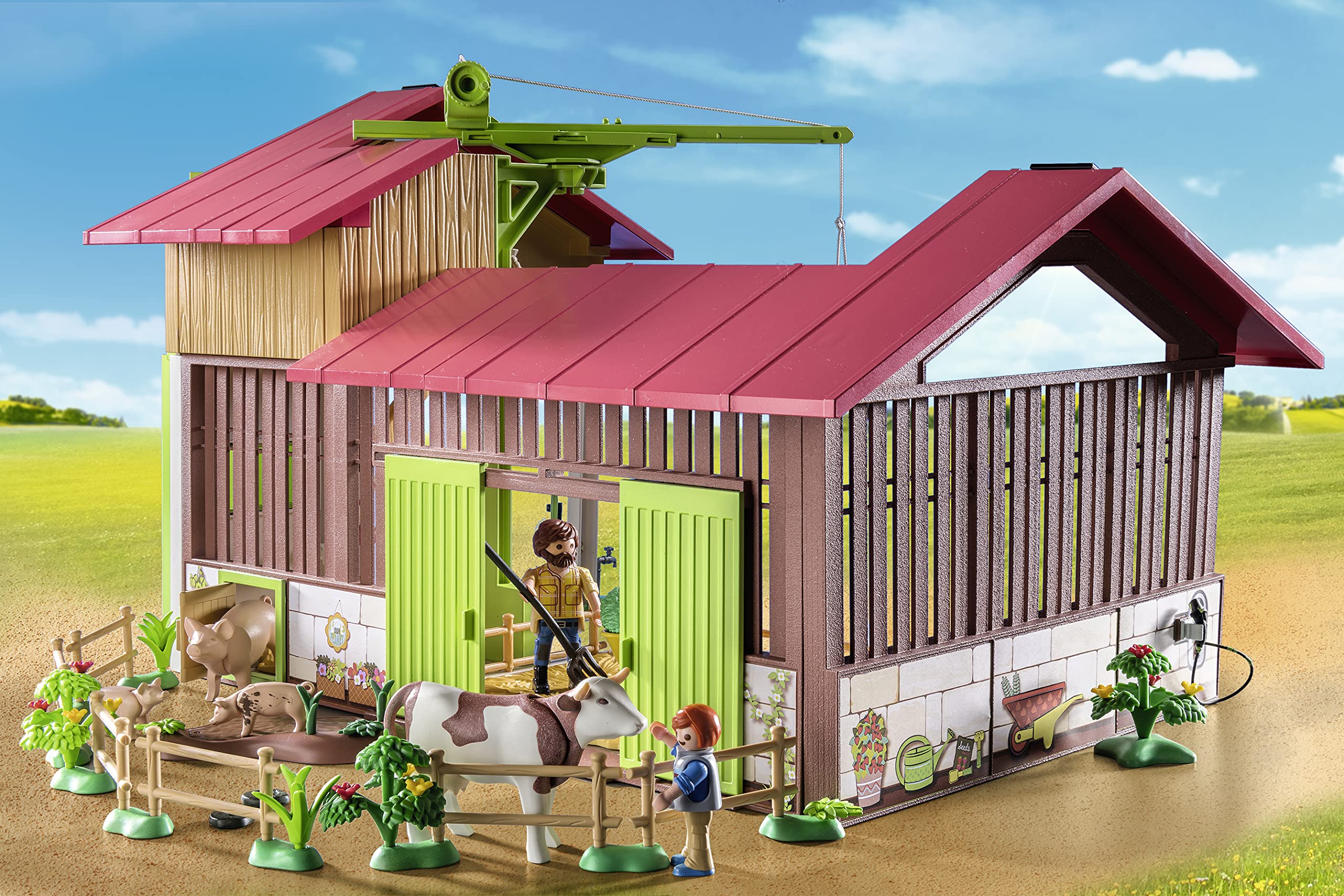 Playmobil Large Farm cows, pigs, dogs, and cats in a pen for interactive animal care.