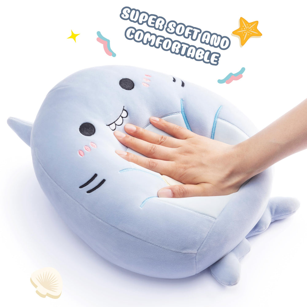 Playnics snug shark pillow supports reading or watching TV.