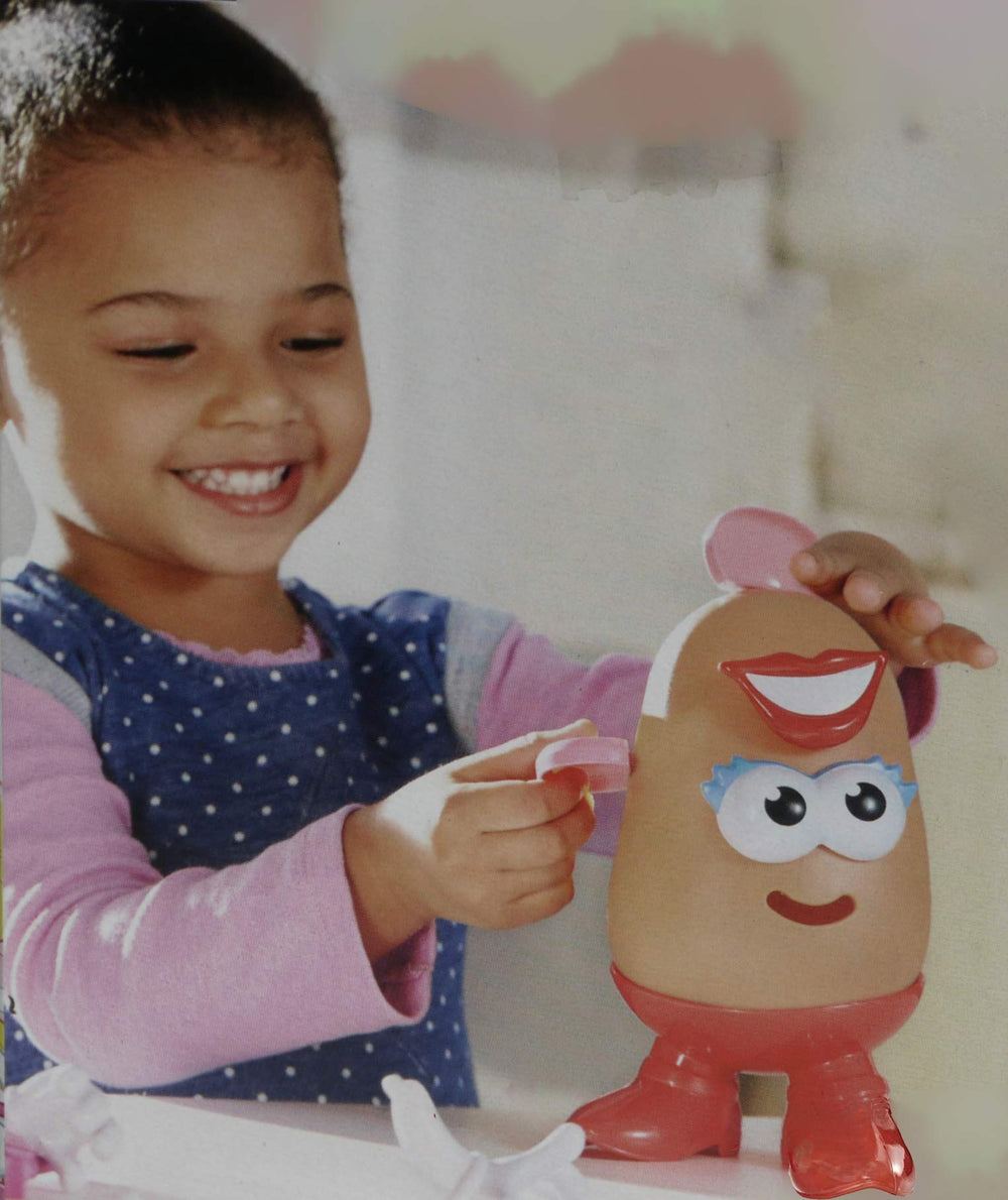 PlaySkool Mrs. Potato Head mouth supports big smiles during silly scenes.