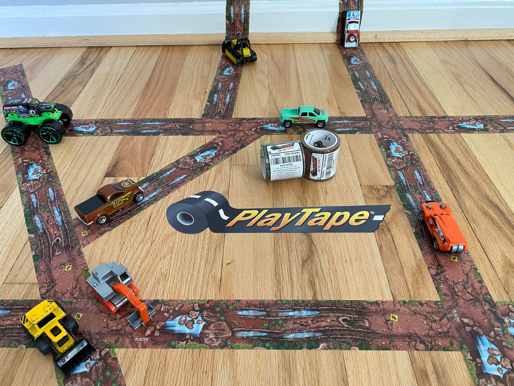 PlayTape Dirt Road unrolled on a table, inviting imaginative play