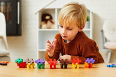 PLUS PLUS BIG interlocking pieces enable easy 3D and 2D constructions.