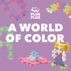 Plus Plus Big 100-piece pastel set with idea guide booklet for inspiration.