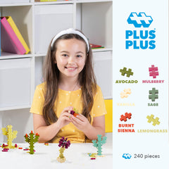 Plus Plus Botanica bricks close-up highlighting interlocking connections for mosaics and 3D builds.