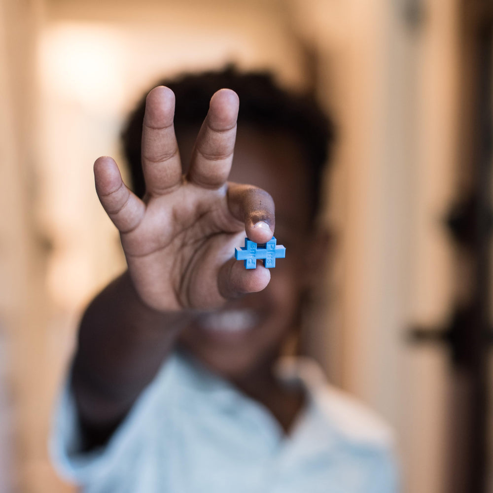 PLUS PLUS glow-in-the-dark blocks enhance nighttime storytelling and play