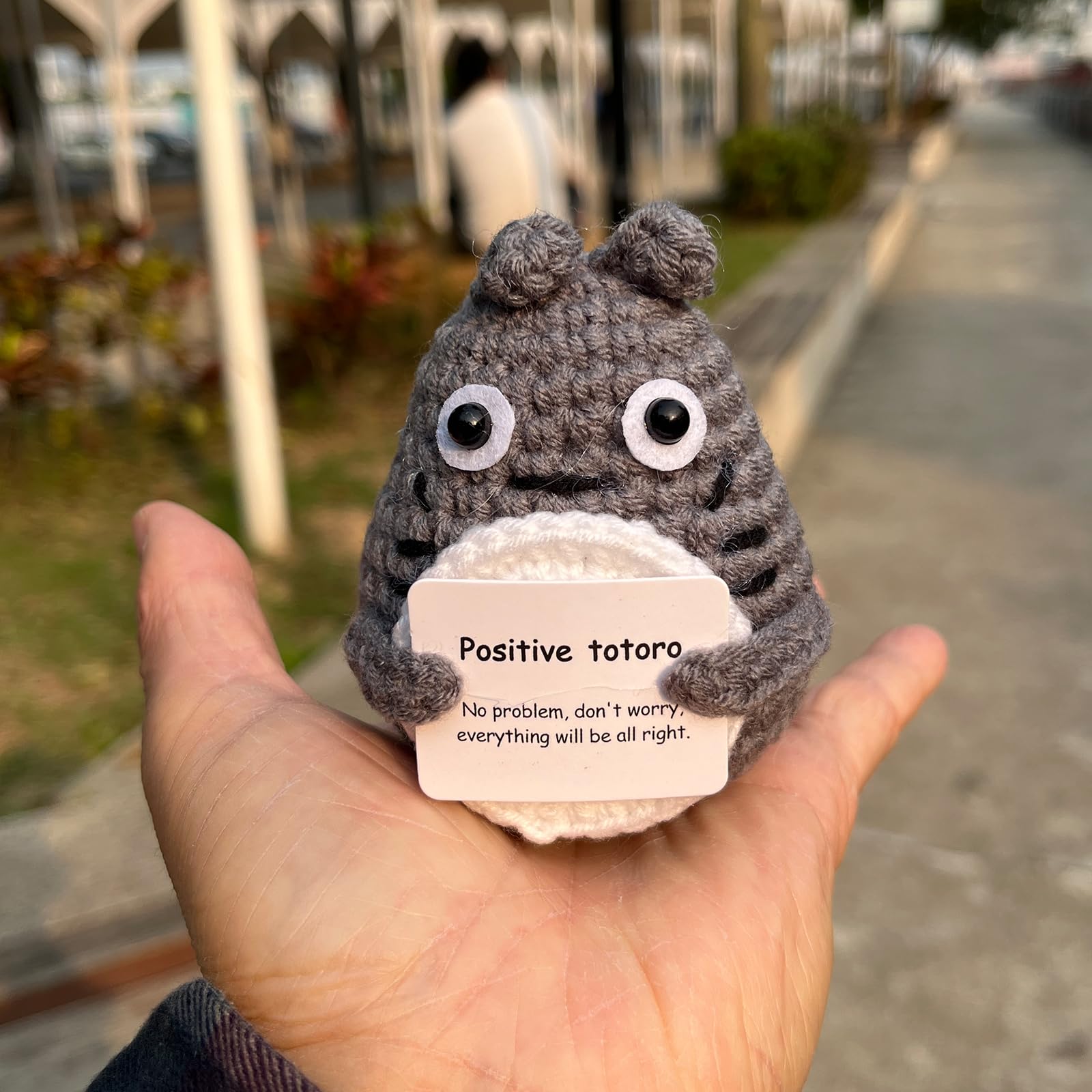 PLWalker emotional support Totoro plush as a desk companion for focus and warmth.