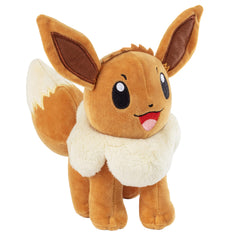 Pokémon Eevee plush face close-up reveals friendly expression.