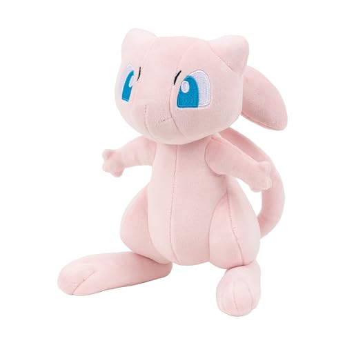 Pokémon Mew plush close-up face highlights gentle stitching and friendly expression.