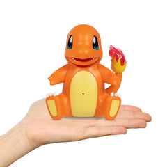 Pokémon My Partner Charmander glows its tail during interactive play