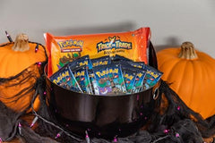 Pokémon TCG mini packs opened to reveal three-card surprises.