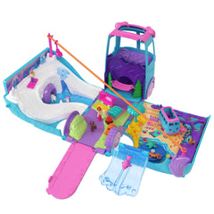 Polly Pocket dolphins surfing beside the pet van for water play adventures.