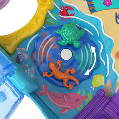 Polly Pocket ski lift with snowy scenery inspires winter pretend play.