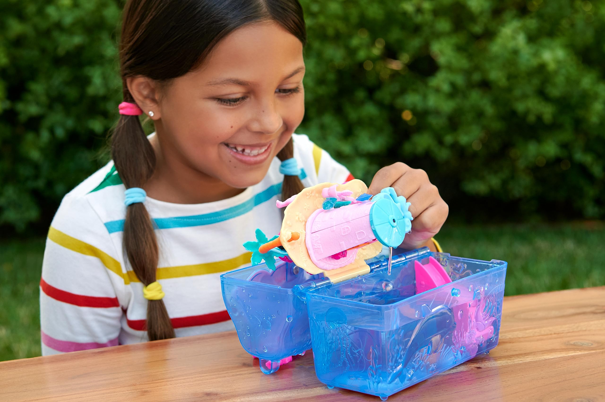 Polly Pocket Sparkle Cove dolls ready for water play and storytelling.