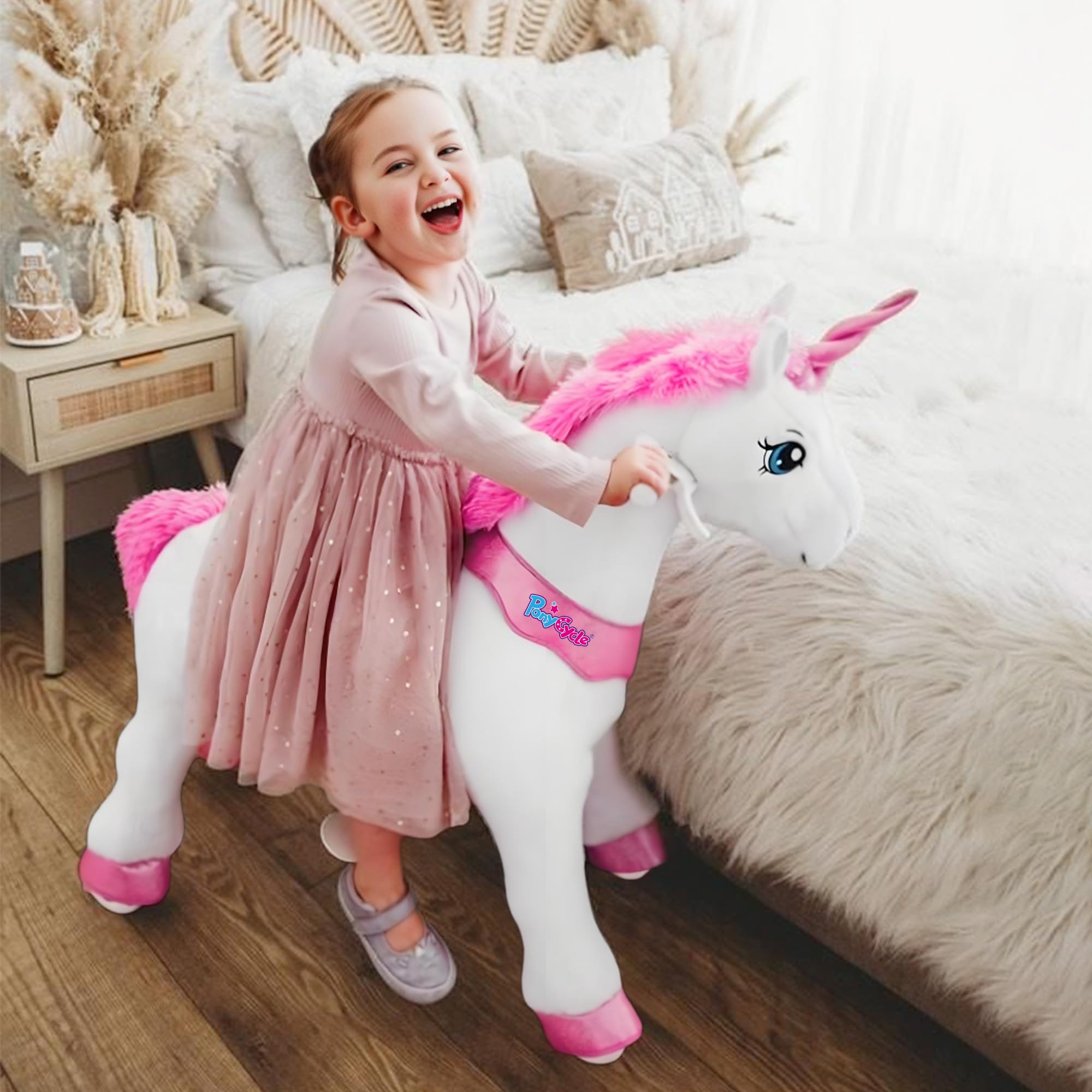 PonyCycle ride-on unicorn pink hands and brake demonstrate easy stop control.