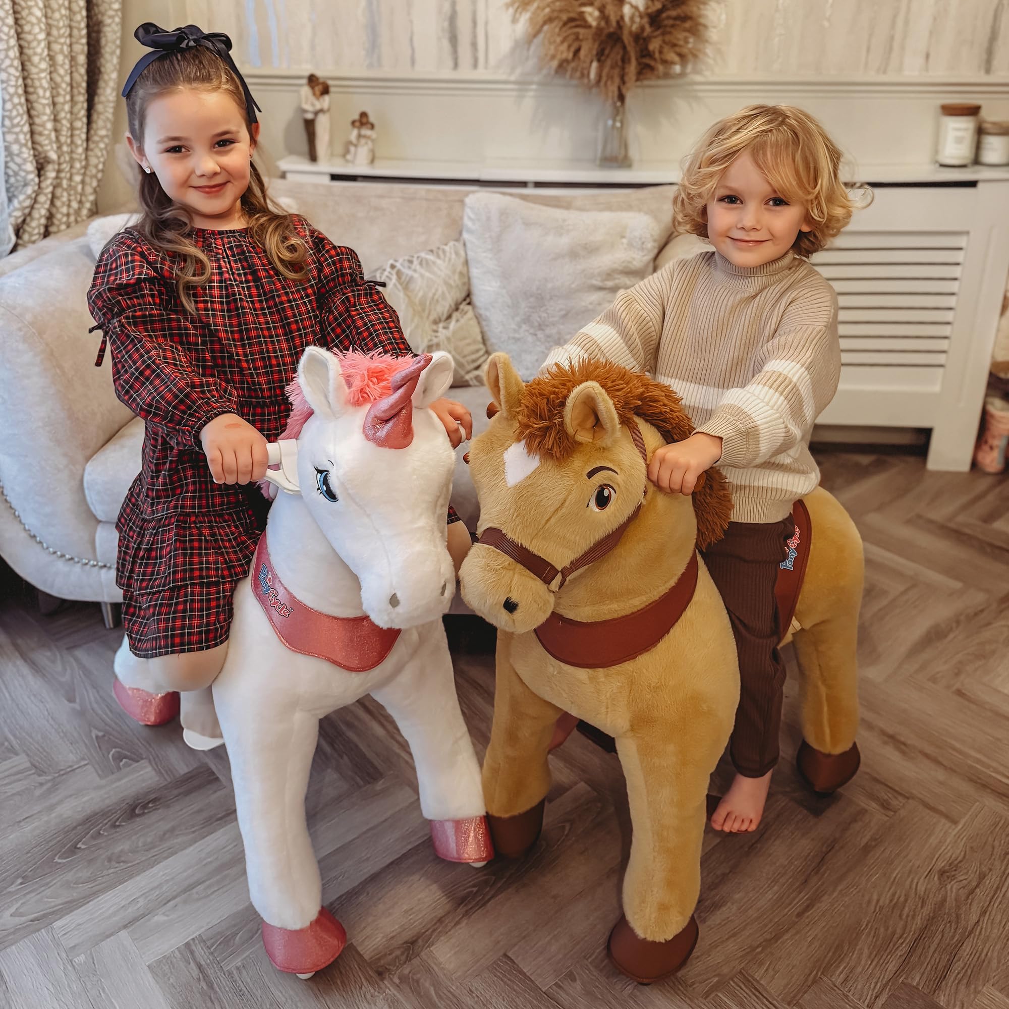 PonyCycle ride-on unicorn pink sturdy handles ensure secure grip while playing.