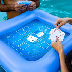 Poolcandy floating game table with waterproof cards for poolside play.