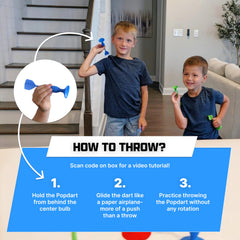 Three Popdarts stuck to refrigerator surface showing easy indoor play