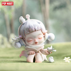 POP MART Skullpanda warmth series figure close-up showing details