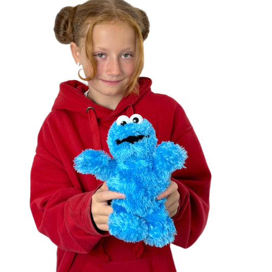 Posh Paws Cookie Monster plush face close-up showing friendly expression.