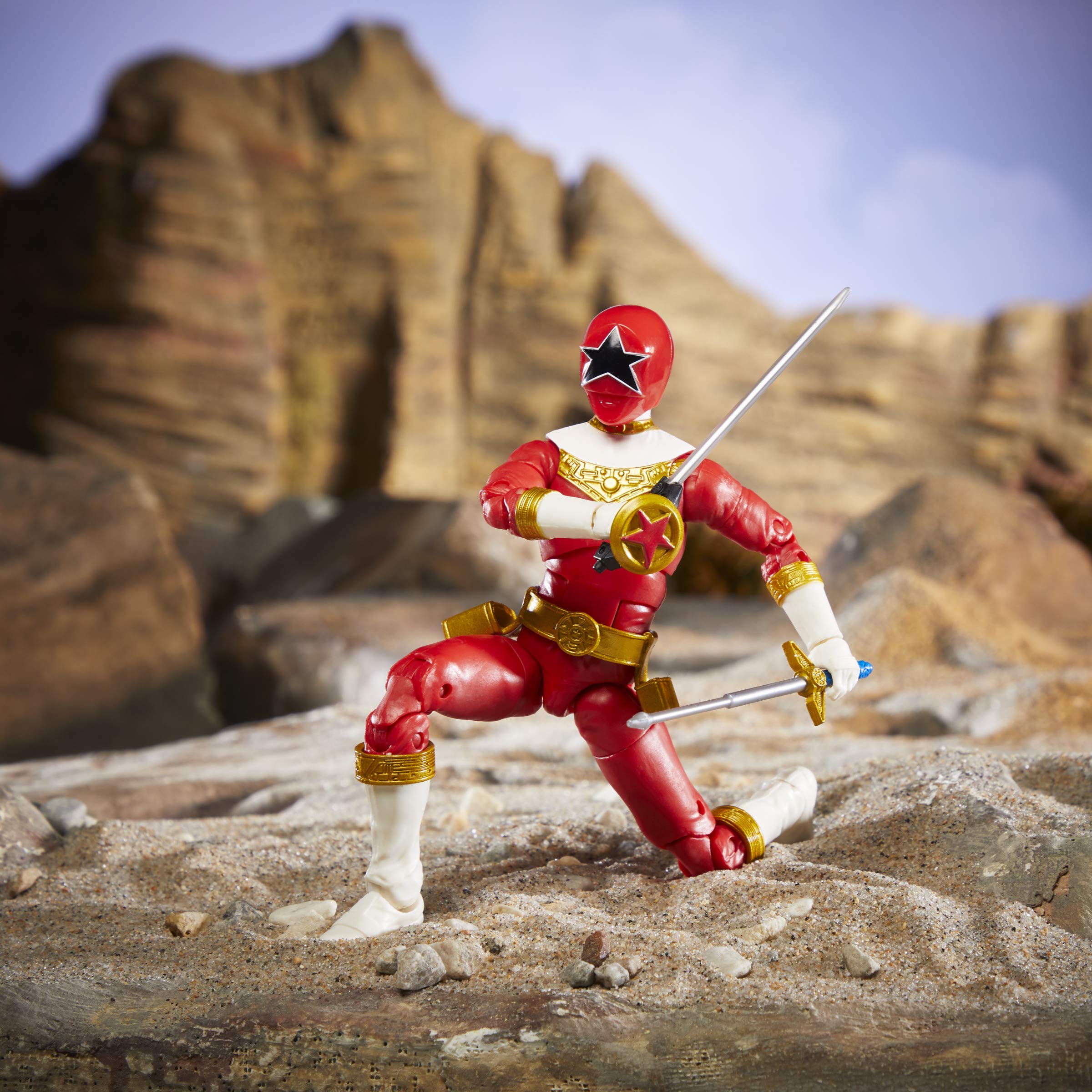 Power Rangers Zeo Red Ranger blast effect piece adds impact to poses.