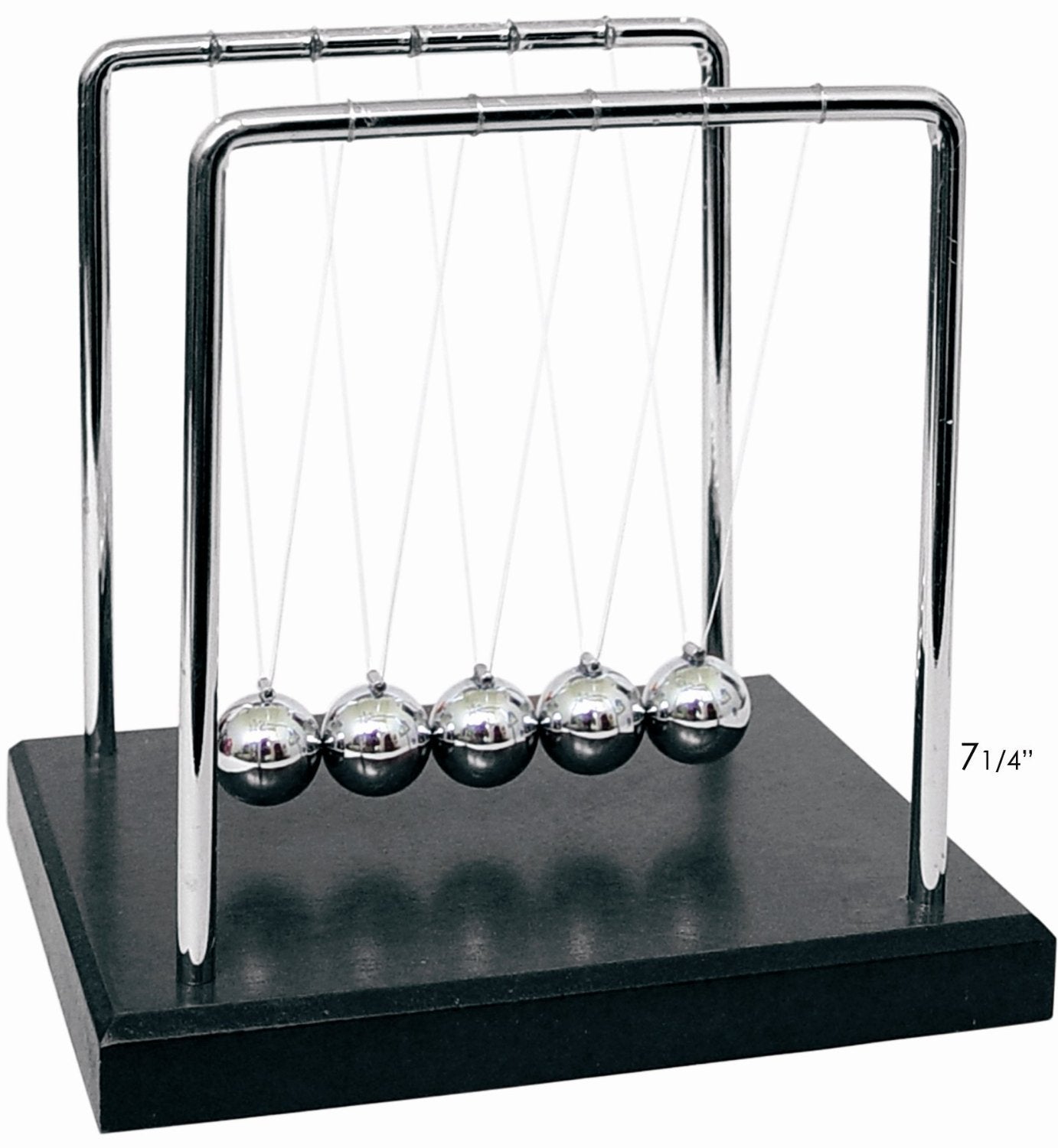 PowerTRC Newtons Cradle balance balls on a desk demonstrating momentum transfer and focus