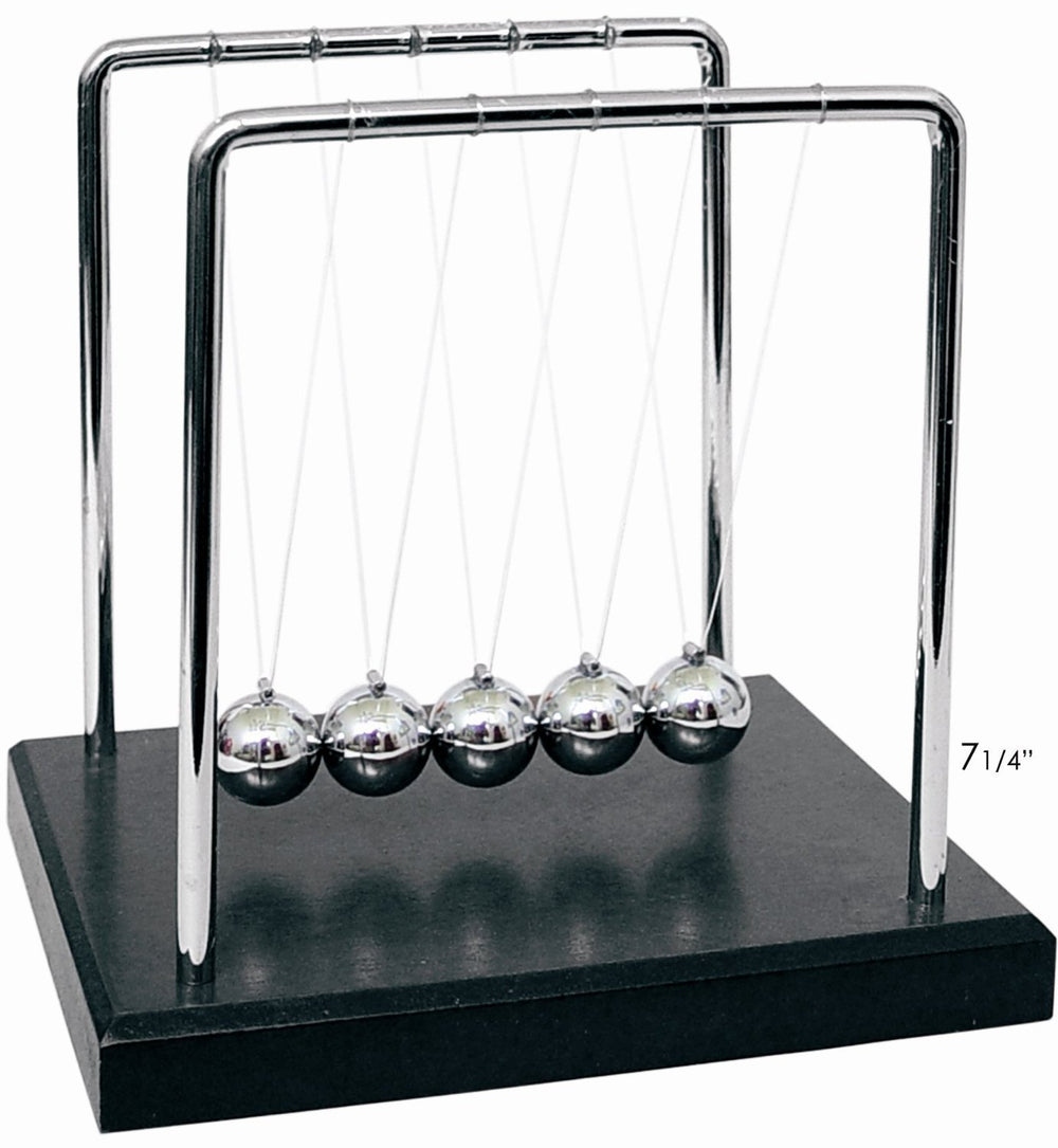 PowerTRC Newtons Cradle balance balls on a desk demonstrating momentum transfer and focus