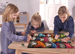 PPuzzling wall decor kit offers a playful accent that sparks conversation.