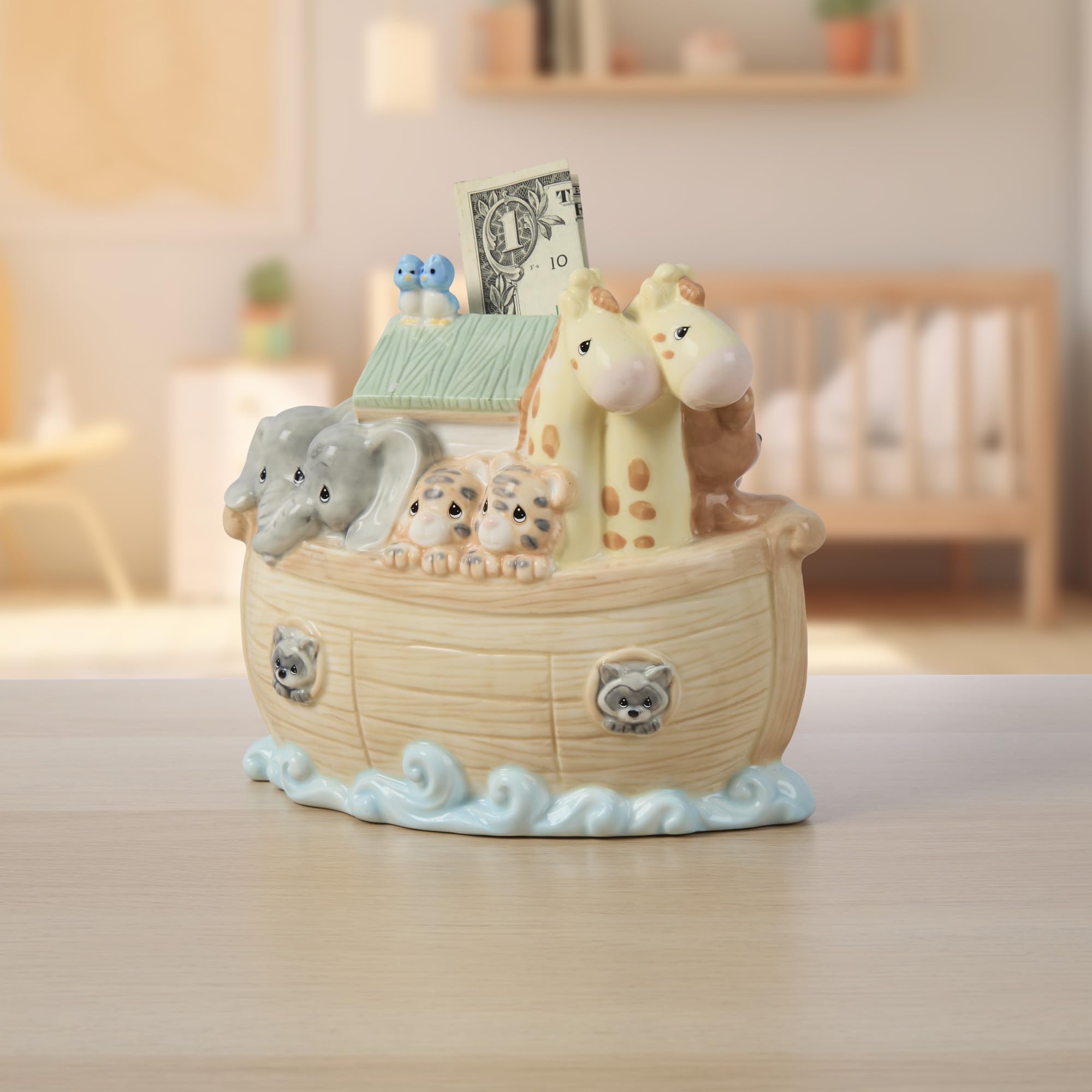 Compact-size Noah's Ark bank fits small nursery spaces and shelves.
