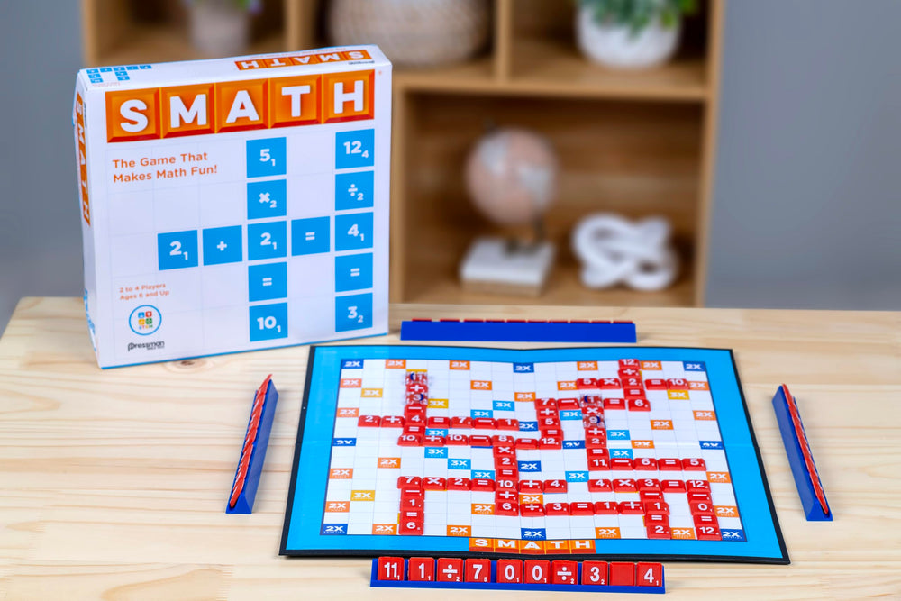 Players around a Pressman SMATH board crafting crossword-style equations.