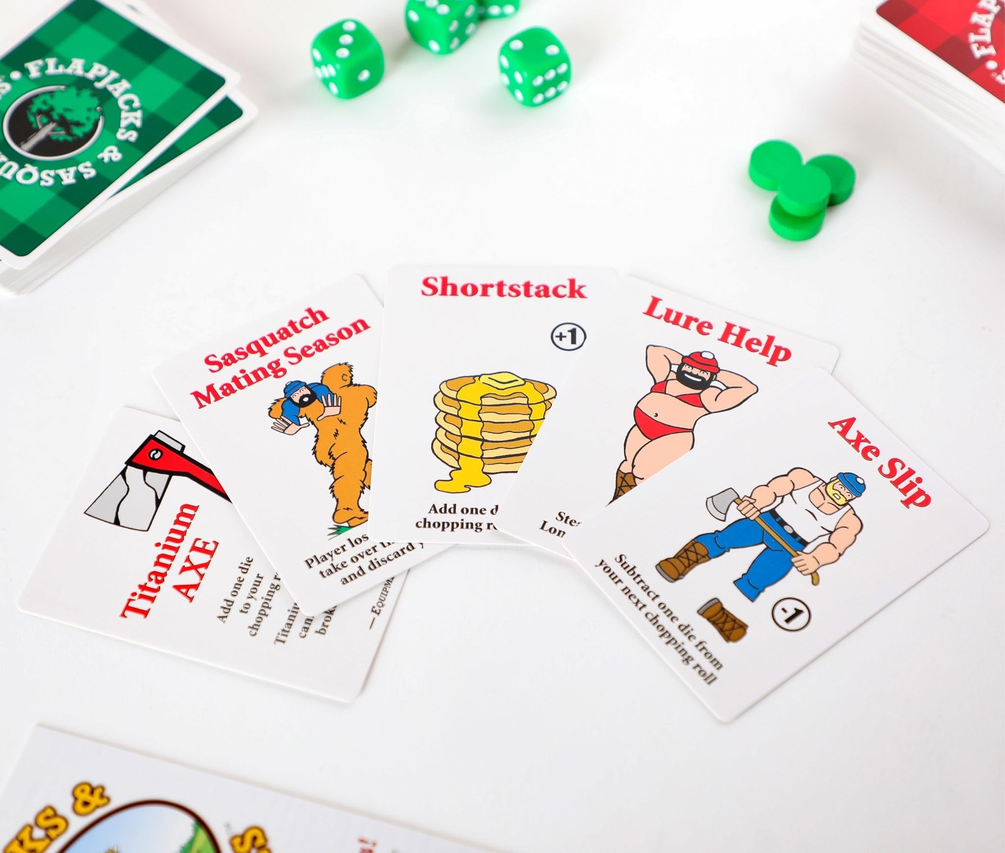 Piled dice and cards inviting fast, family-friendly rounds and shared moments