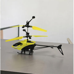 PTGHT gesture-sensing helicopter yellow LED lights close-up for enhanced indoor visibility.