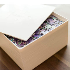 PUZZLE EZ 8x8 tray keeps puzzles tidy on the table.