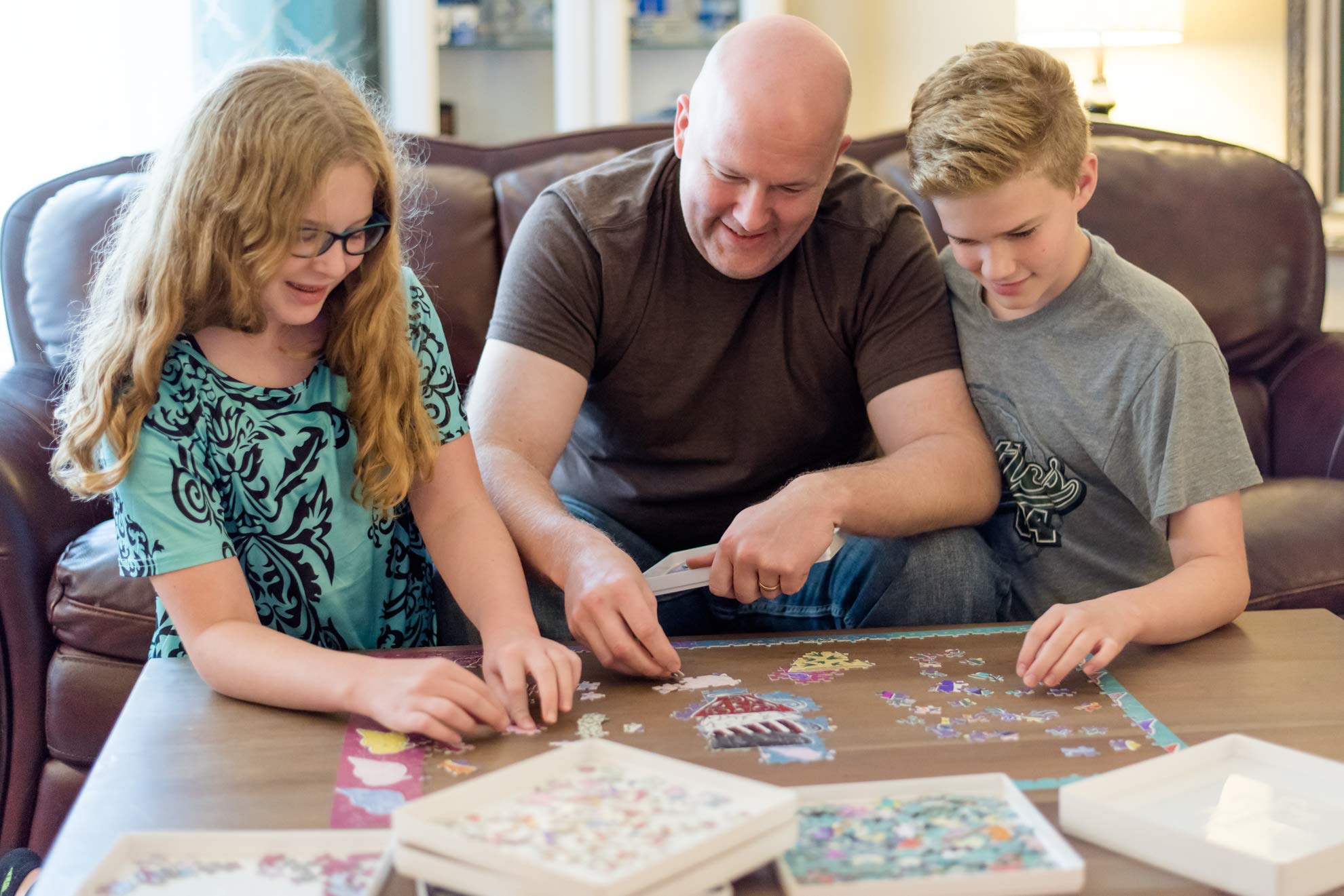 PUZZLE EZ sorter by color, edge, or shape for faster assembly.