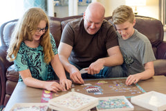 PUZZLE EZ sorter by color, edge, or shape for faster assembly.